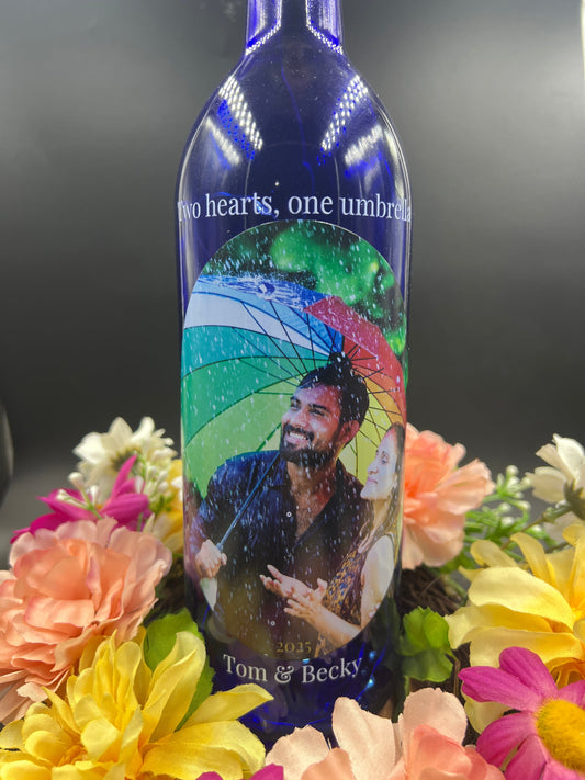 Precious photo memories printed directly onto your choice color of blue, green or clear bottles and special text message for a friend or loved one. 