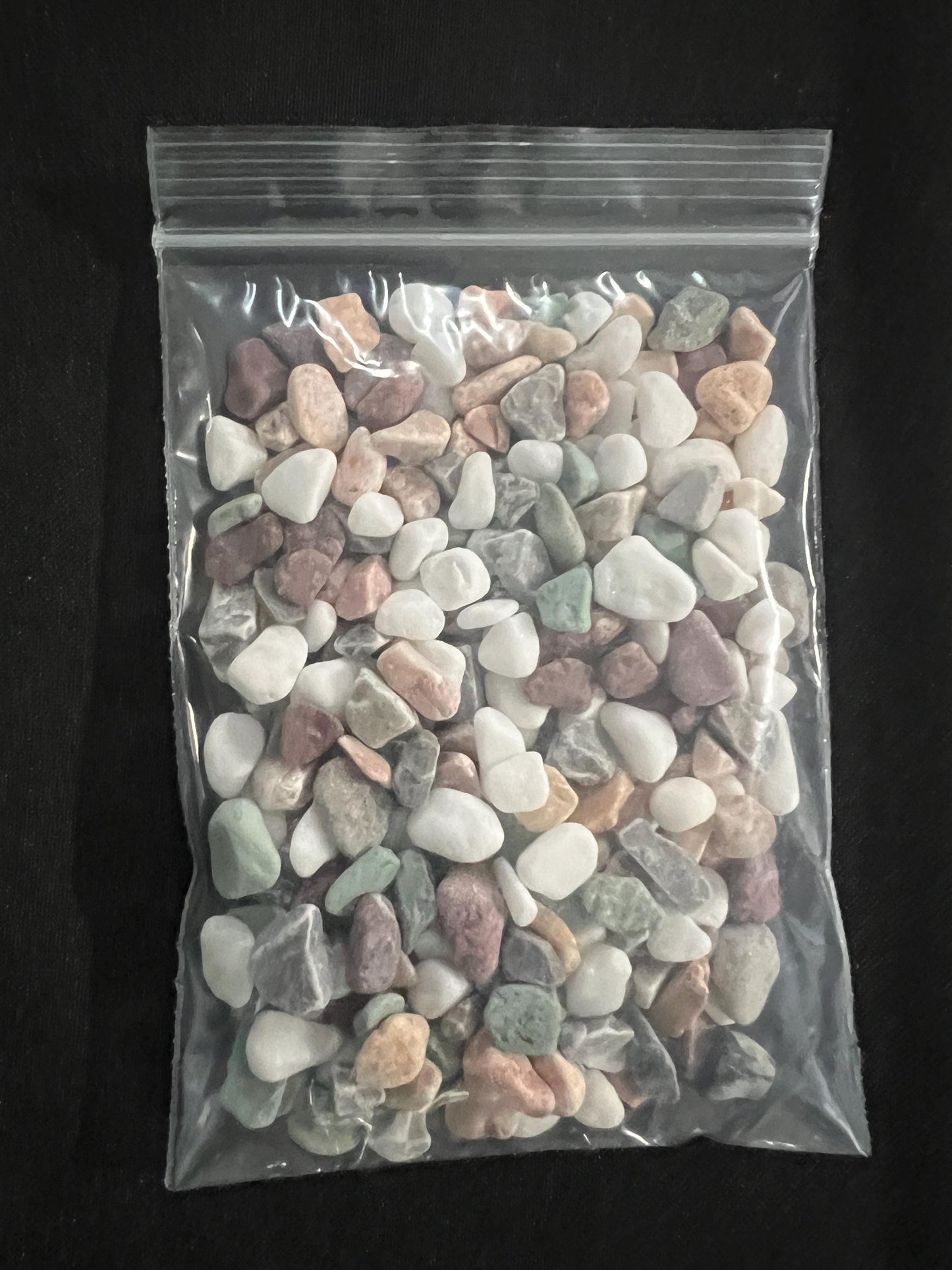 Clear plastic bag showing river rocks