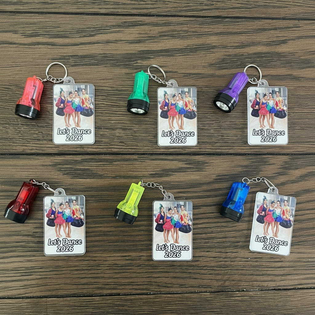Dance organization images on acrylic keychain with led flashlight attached. 