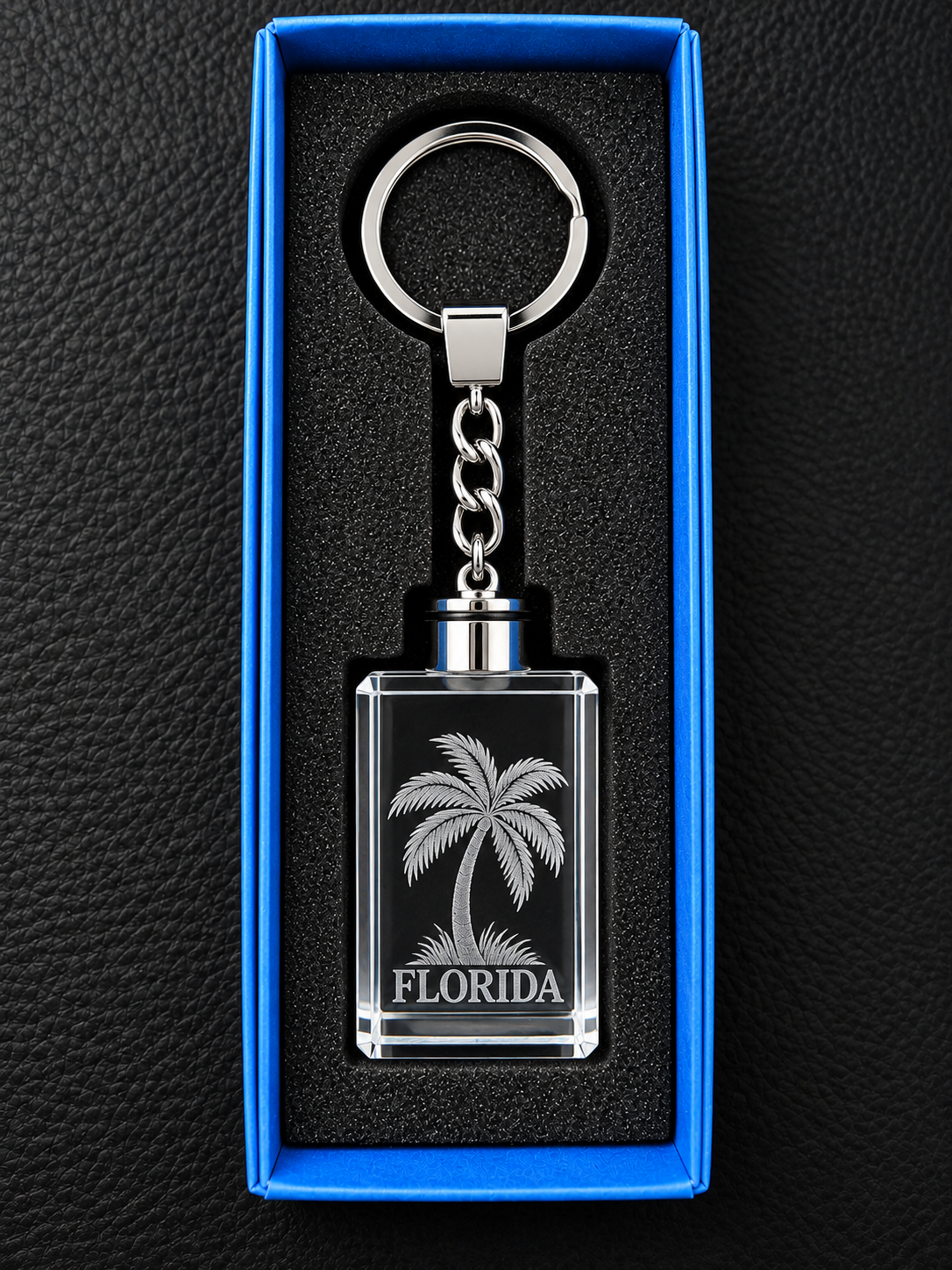   Florida rectangular crystal keychain with 3D laser-engraved palm tree in a blue gift box
   