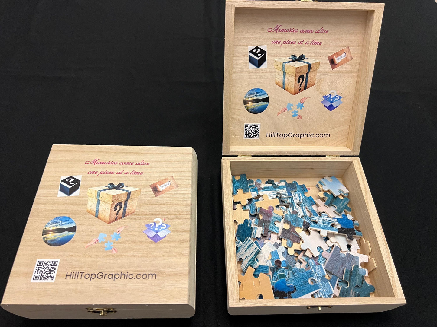 Wooden puzzle box with a partially completed puzzle inside, featuring HillTopGraphic.com branding.