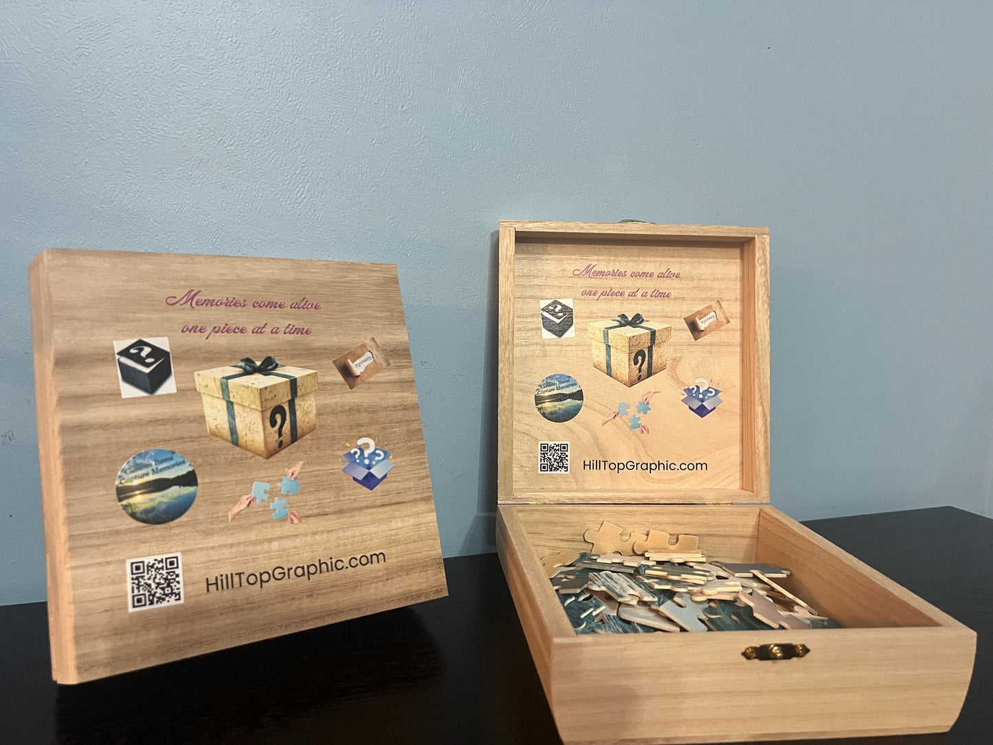 Wooden puzzle box with decorative elements and a QR code on a gray background
