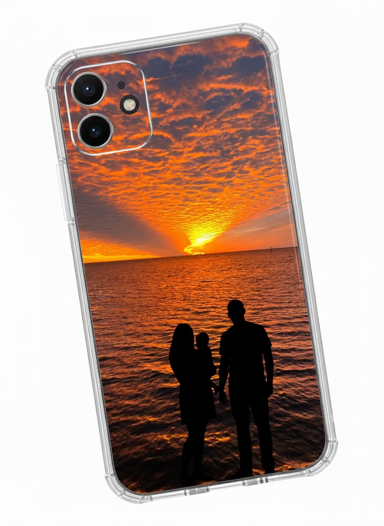 Phone case with a sunset design featuring a family by the water